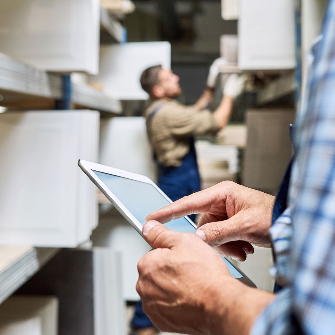 image of a man using a tablet