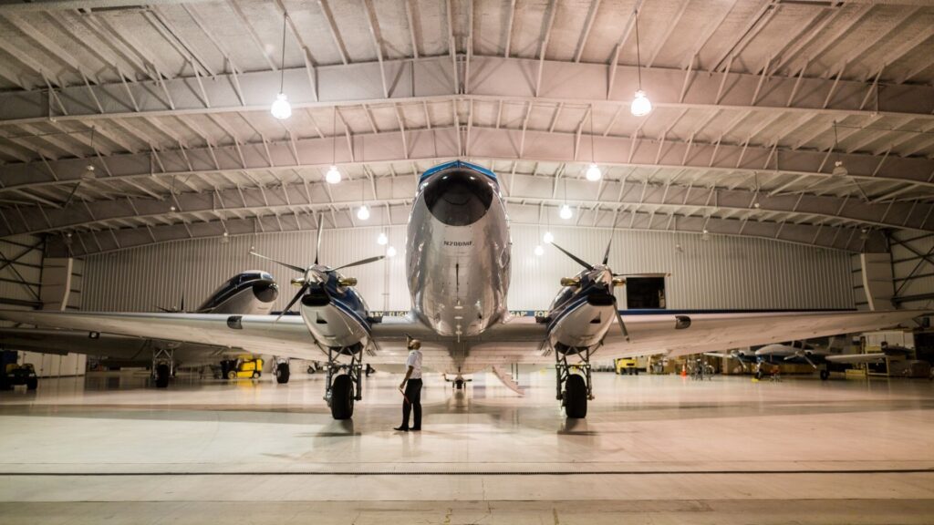 Aircraft in hangar representing aviation ERP onboarding